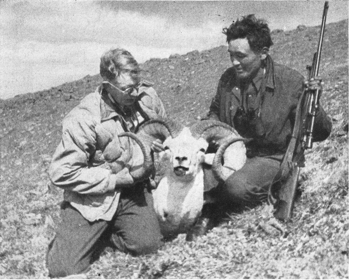 hunters with sheep