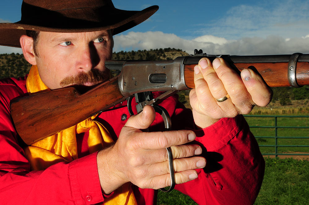 Aram von Benedikt aiming an all-purpose rifle