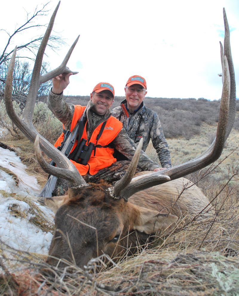 John and Todd take a moment to celebrate. John took this bull with a Mossberg 4X4 topped with a Zeiss Victory scope Remington 180-grain Bonded Core-Lokt bullets. His elk took 10 steps and toppled over.