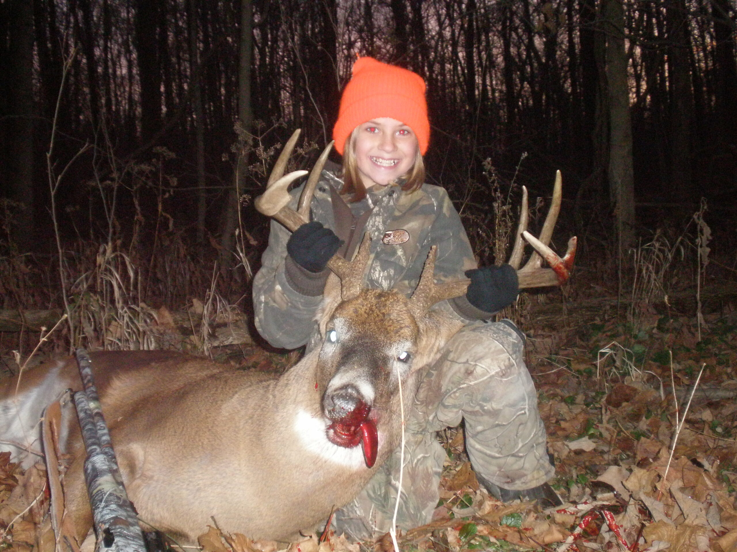 The inside spread of my buck measures 18 3/8 inches. The deer field dressed over 230 lbs.--Carah Beck