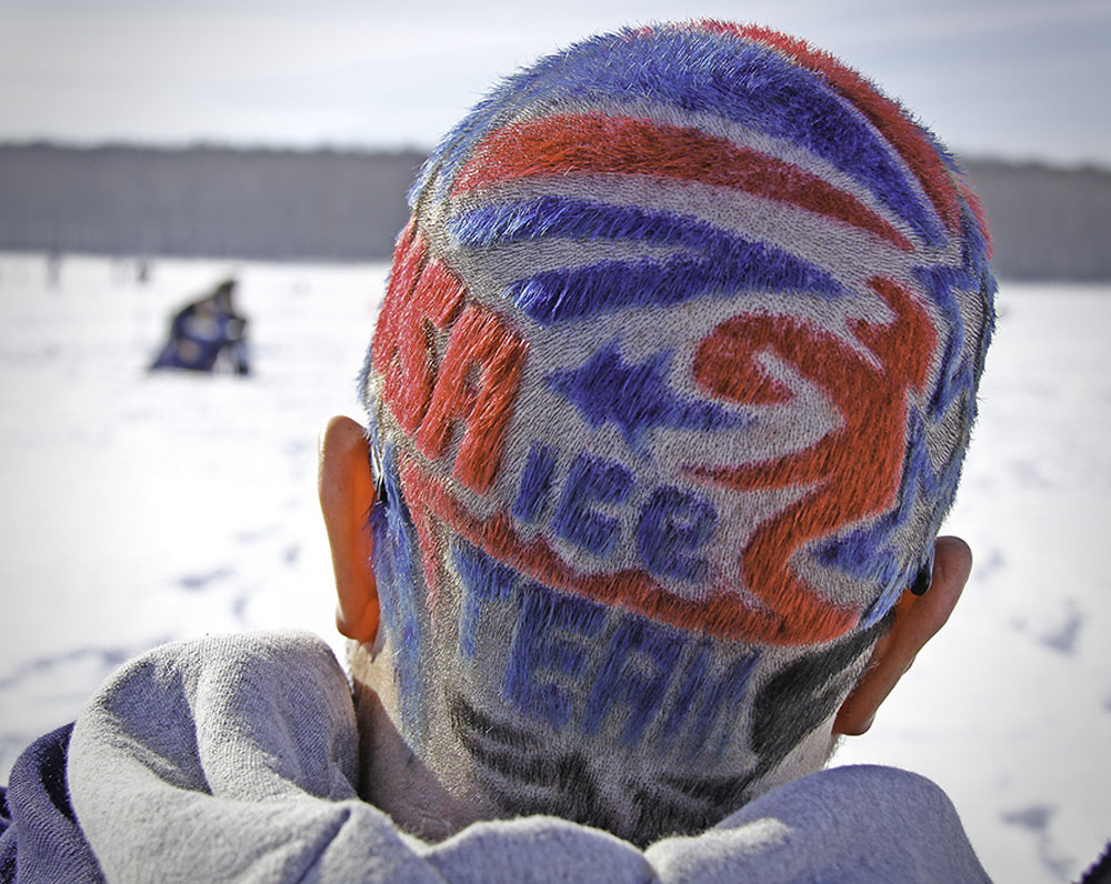 The 2013 World Ice Fishing Championships, held Feb. 16-17 on Big Eau Pleine Reservoir near Wausau, Wisconsin, pitted 11 nations in heated battle, with pride of country and medals on the line. International ice fishing competition is contested under strict and detailed rules--two days, three hours each day. Teams fish separate zones for the first two days. Sectors are marked using ropes and cones, each 400 feet by 200 feet. Five 'fishers' form the lineup of each nation, with one randomly assigned to each of the five sectors. In other words, you have no teammates inside your sector. Each fisher is granted a spotter, who must stand outside the sector but can talk and give direction. Coaches are allowed to walk the neutral zones between sectors, but cannot enter the sector. They are allowed to talk with their fishers and coach them during the competition. After the ice chips settled on Day Two, Russia had won the team gold with 42 points (low score wins). Finland won silver with 48.5 points, and Lithuania bronze with 49 points. Team USA, favored to win a medal going in, had a tough first day, rebounded well on Day Two, but finished just out of a medal in fourth place, with 51 points. American Chad Schaub had the biggest catch of the competition on Day Two and soared into third place to win an individual bronze medal. Fighting back tears at the weigh-in and having difficulty talking, he mainly expressed disappointment that the Americans missed a team medal so narrowly, but was obviously thrilled to be taking home a medal to Michigan. All in all, it was not what Team USA had drawn up, but there was great pride that they won Day Two handily over every other country. "I thought the team performed almost flawlessly today," remarked coach Brian Gabor immediately after the horn sounded, ending the event. "There were a few tactical things, but everybody did the game plan, and the game plan worked." Team USA trials set for early March: open trials are being held in a few weeks, to select the 10 members of 2014 Team USA Ice Fishing. The trials are March 8-10, 2013, near Rhinelander, WI. Team USA will be traveling to compete in the World Championships next February in Belarus. For more information and to register to compete, go to <a href="http://www.usaiceteam.com">www.usaiceteam.com</a>.