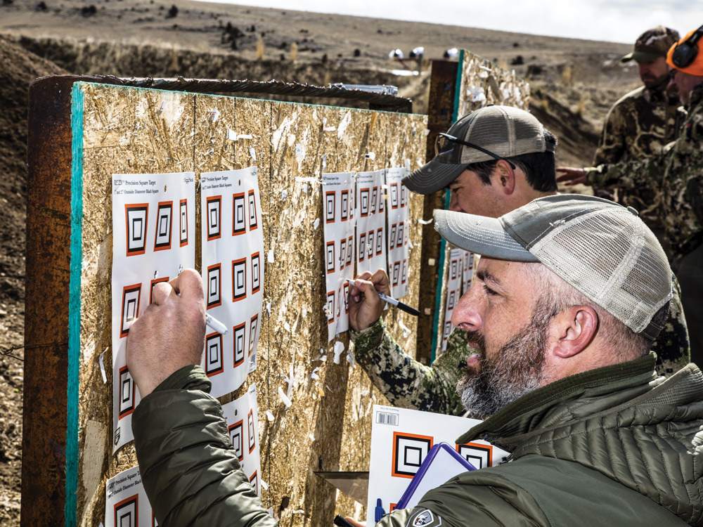 shooters marking targets during gun tests