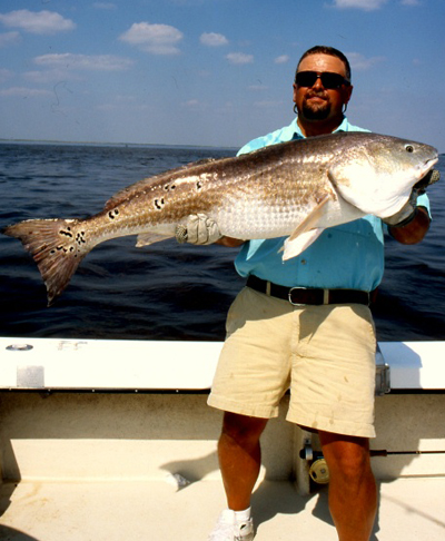 While monster redfish can be caught in almost any condition, rough autumn weather with wind blowing 20 to 30 knots often produces the best action, says captain Mark Noble from St. Simons Island, Georgia. Shallow sandbars at the mouths of inlets and passes can offer superb fall fishing, in water so rough it's difficult to keep a boat anchored. Shoal waters from 6 to 15 feet deep can be choice.