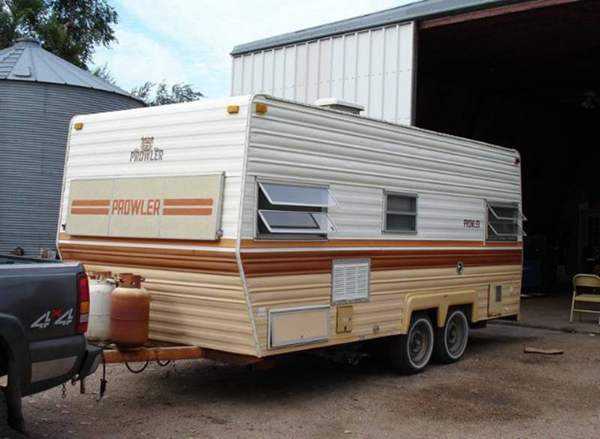 Start with a small to medium size camping trailer.