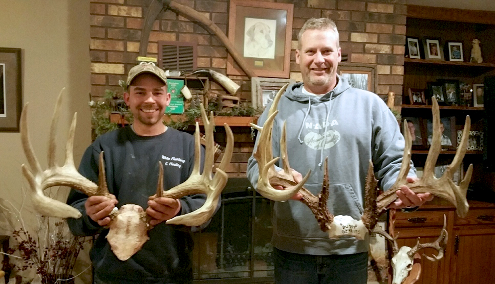 <em>Adam Hupf and Dusty Gerrits (right) display their top two state record typical archery kills. The two bucks differ by just fractions of an inch when it comes down to total inches of bone: Hupf’s buck gross-scored 200 4/8 inches, and Gerrits’ buck gross-scored 200 1/8 inches.</em>