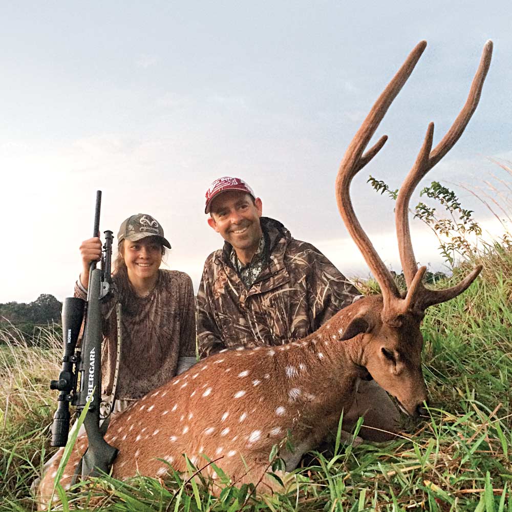 Andrew McKean and daughter hunting Hawaiian axis bucks