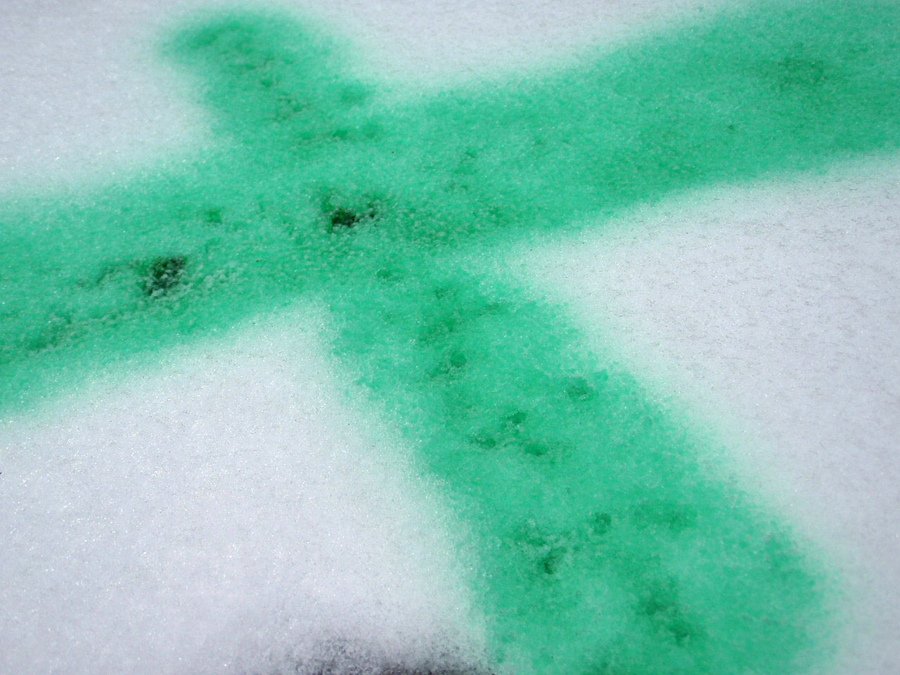 green cross on snow