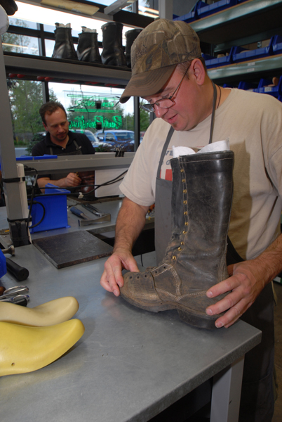 <strong>Rebuilding</strong><br />
This craftsman trained for years before he gained the skills to move over to the boot repair shop. This pair of beat-to-death logging boots is getting new Gore-Tex/Danner quilted liners and later, a new set of Vibram soles.