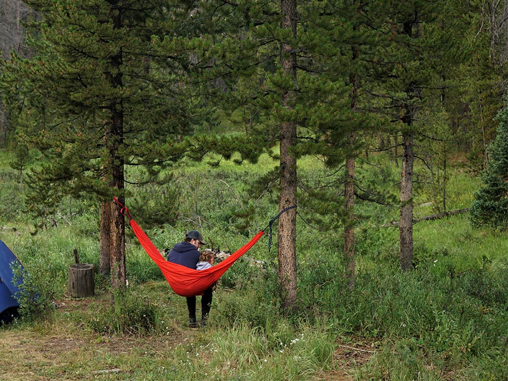 father and daughter in hammock arapaho national forest