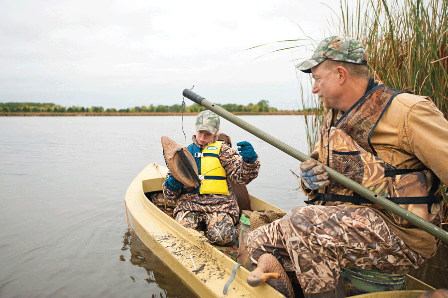 Duck hunting in a river from a canoe can help you find plenty of birds.