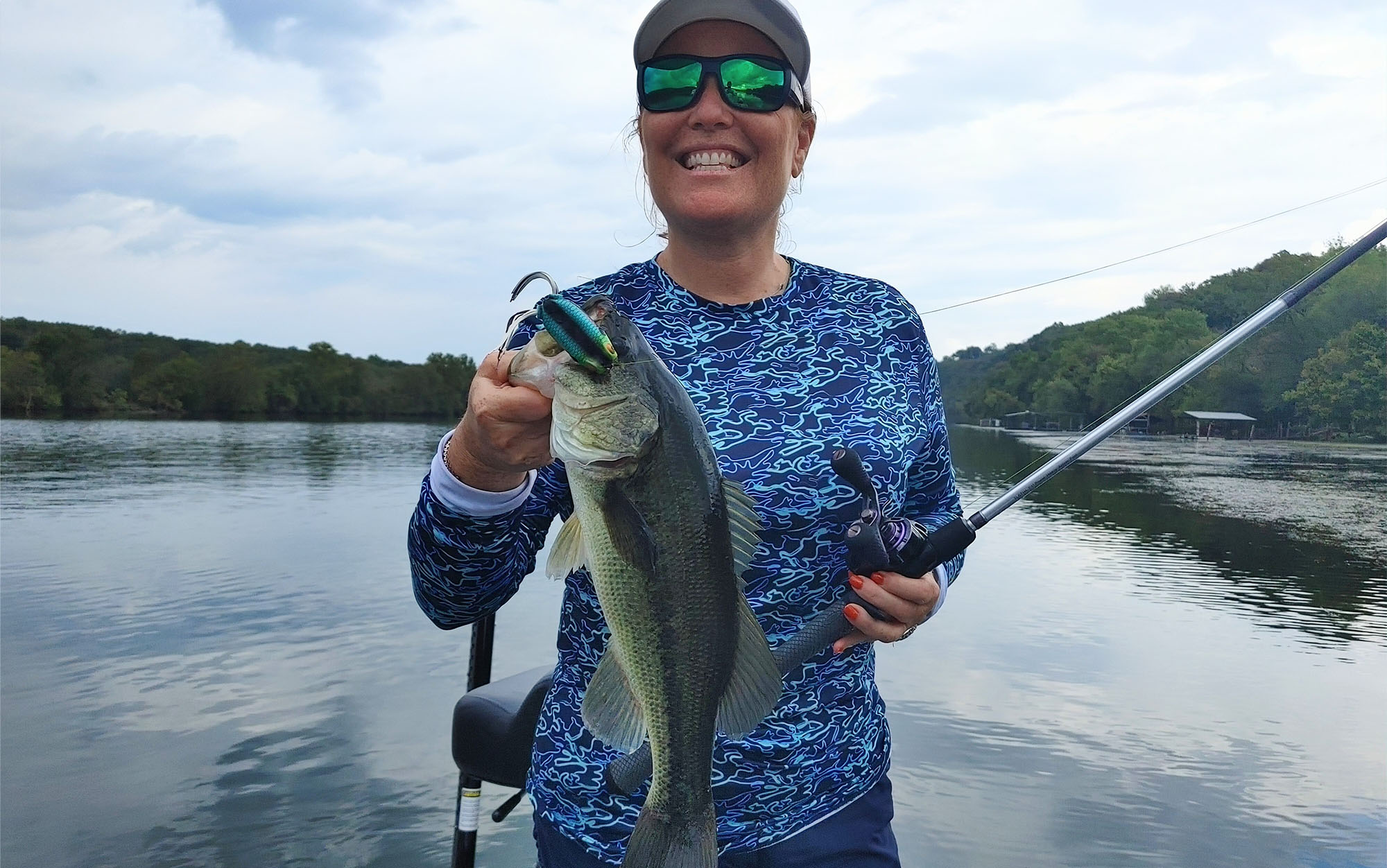 An angler finding success with a frog lure.
