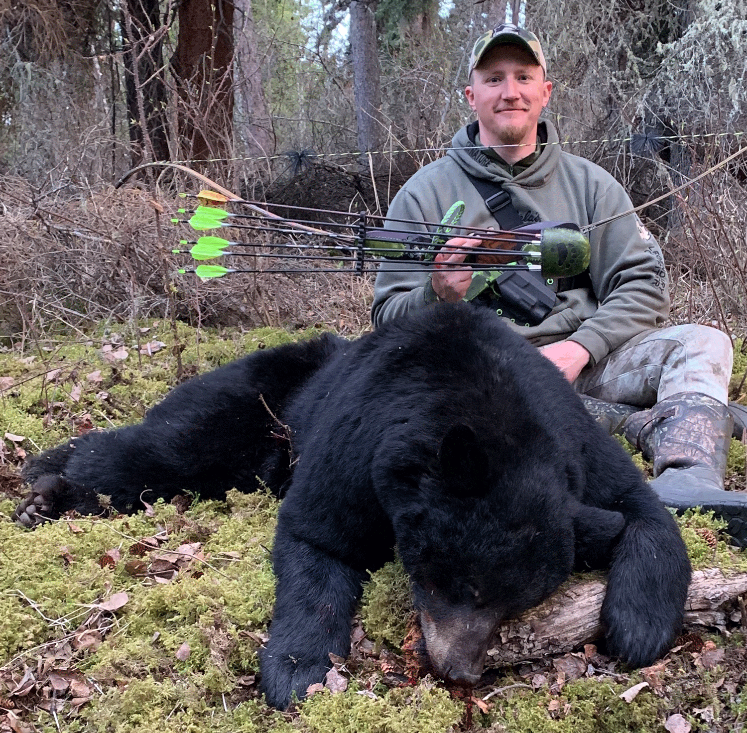 Tyler Freel bowhunting bears in Alaska.