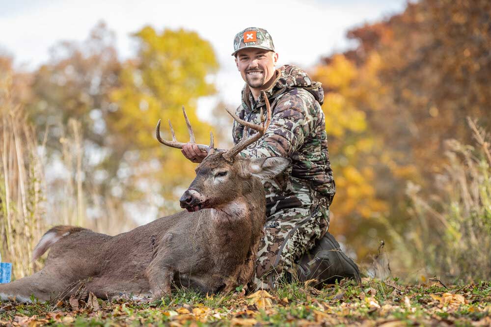 Mark Kenyon with a large whitetail buck.