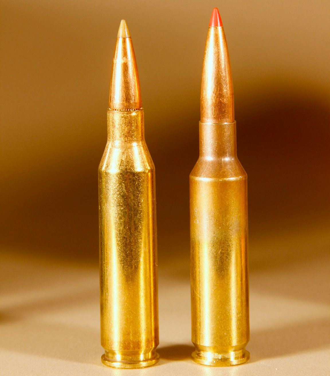 A side-by-side of rifle cartrdiges.
