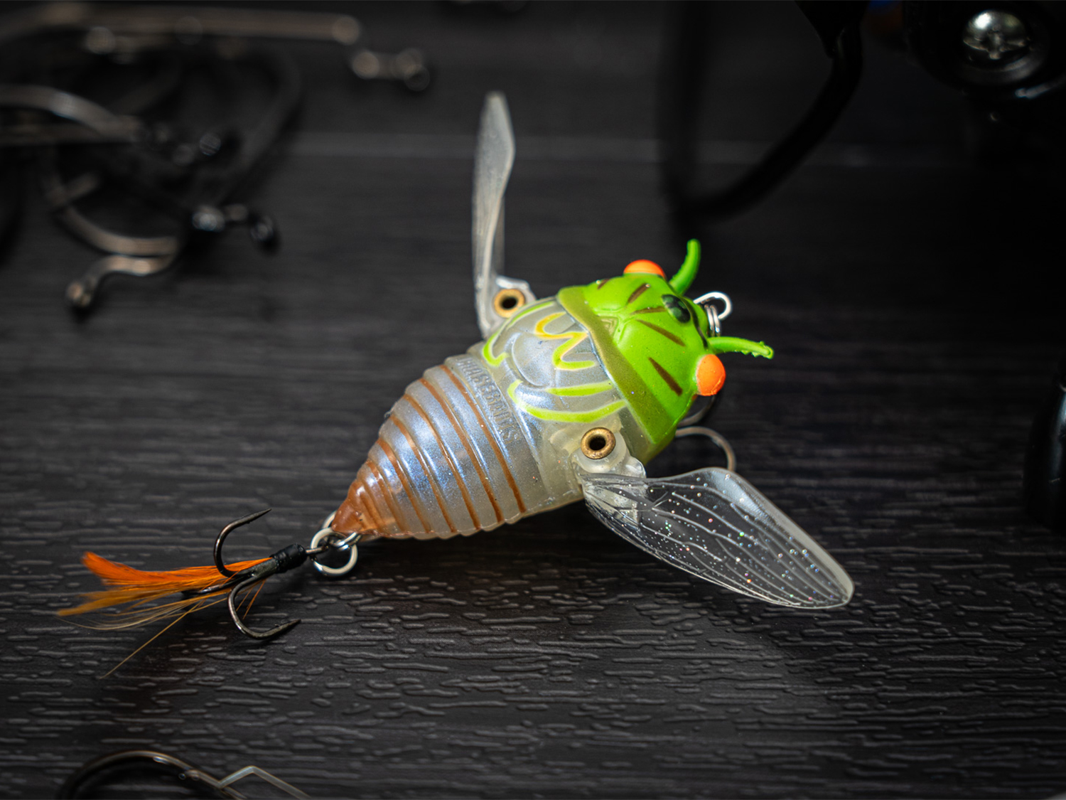 Ripple Cicada fishing lure on a white background.