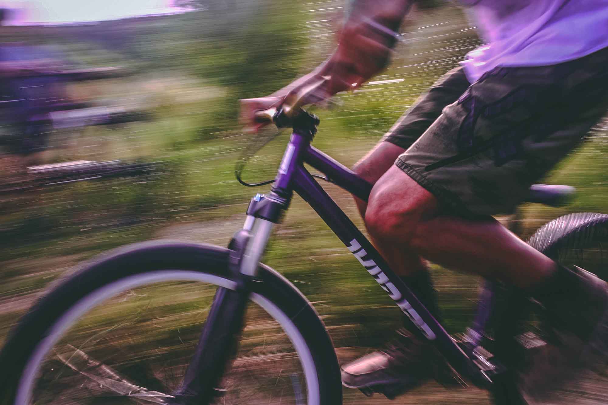 Closeup of someone riding a bicycle