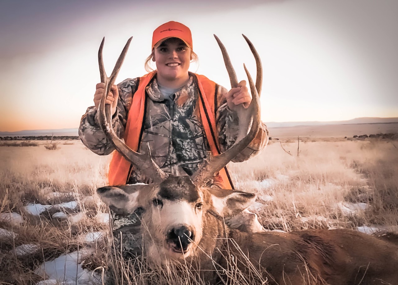 Alyssa Chavez with her Colorado public-land mule deer.