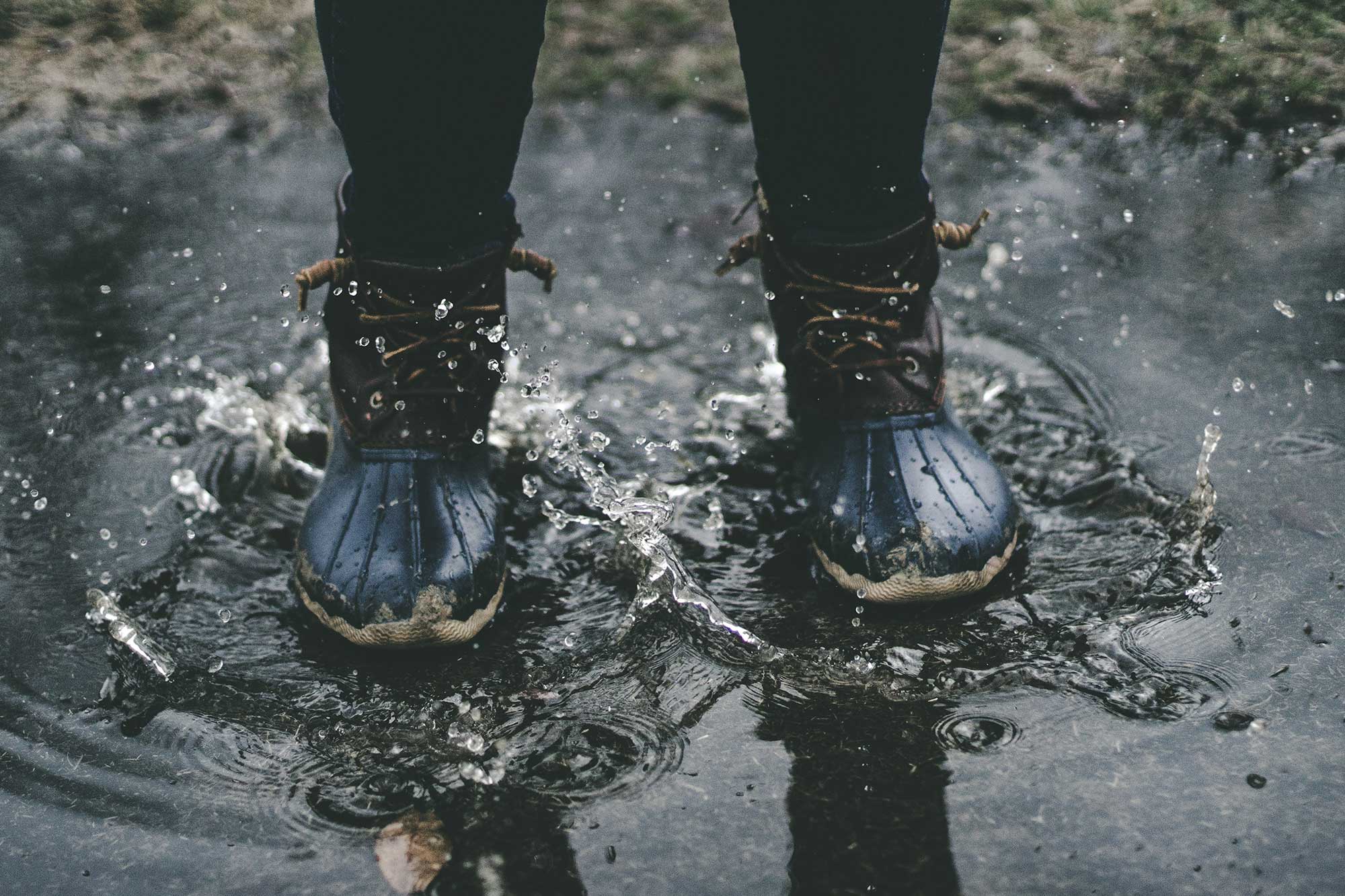 Duck boots in a puddle
