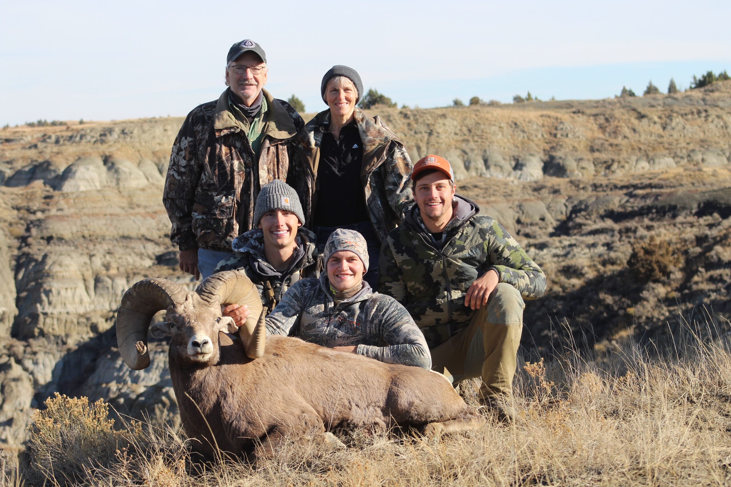 A group of hunters with a new record North Dakota ram.