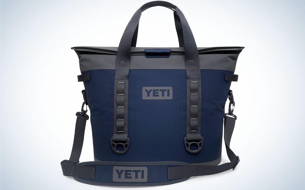 A dark blue and grey soft coolest bag with two holders and with no chains.