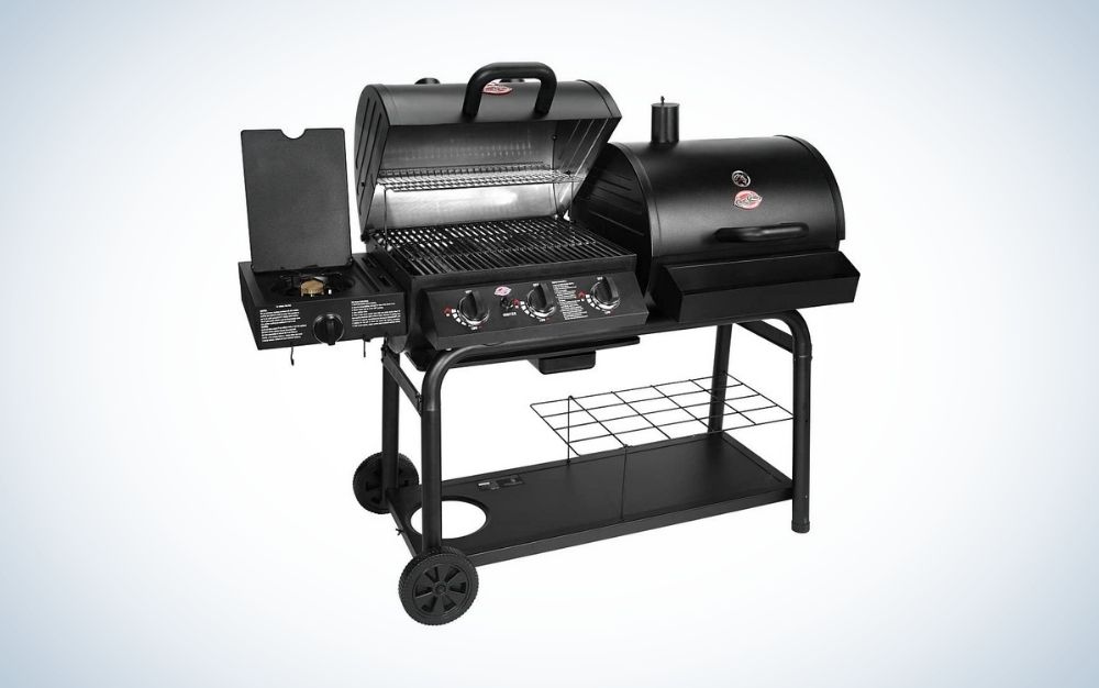 Black charcoal grill with gas and three burners