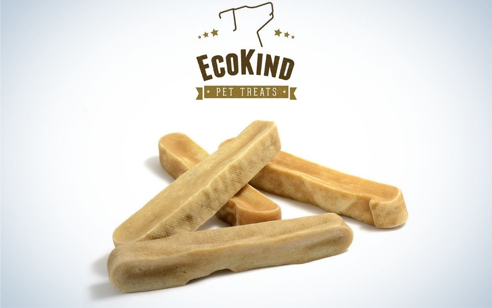 Four beige Yak cheese dog chews from EcoKind dog treats.
