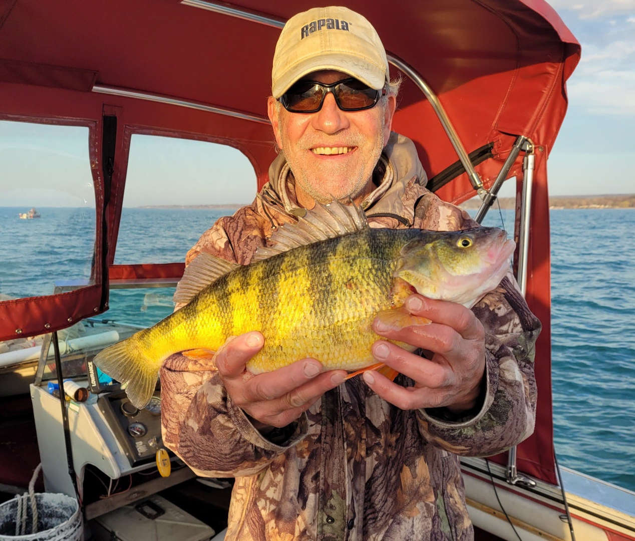 Man catches the state-record perch for Pennsylvania.