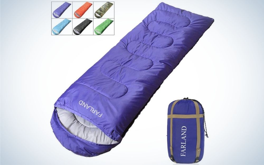 A sleeping bag for thick camping and green color like a big quilt cover, with some kind of colors and with a bag to put it inside.