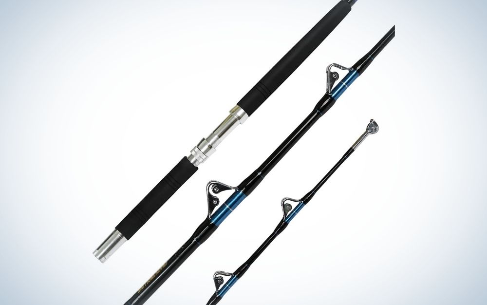A trolling fishing rod with three different shape sticks but the same color black and silver.