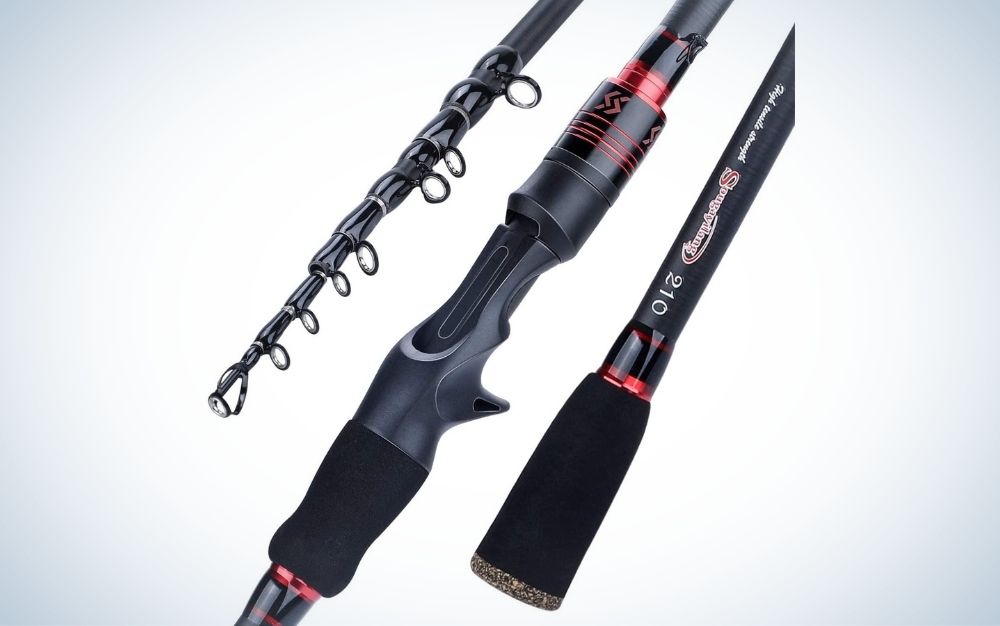 A trolling fishing rod being pictured more closer in details with three different shape sticks but the same color black and red.