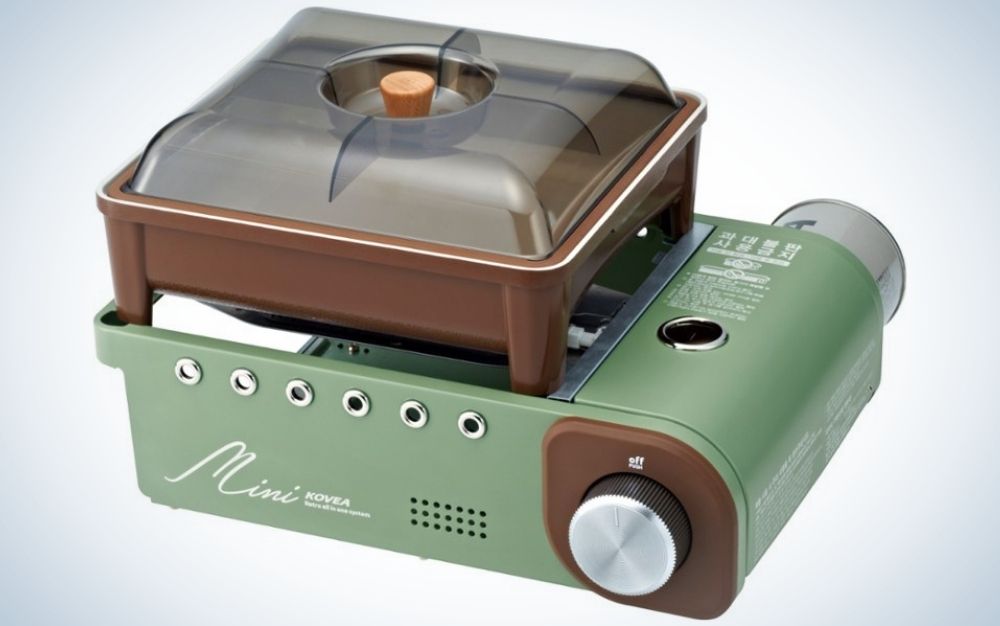 Green and brown mini stove with a handy lid that doubles as a plate or bowl for unique father's day gifts
