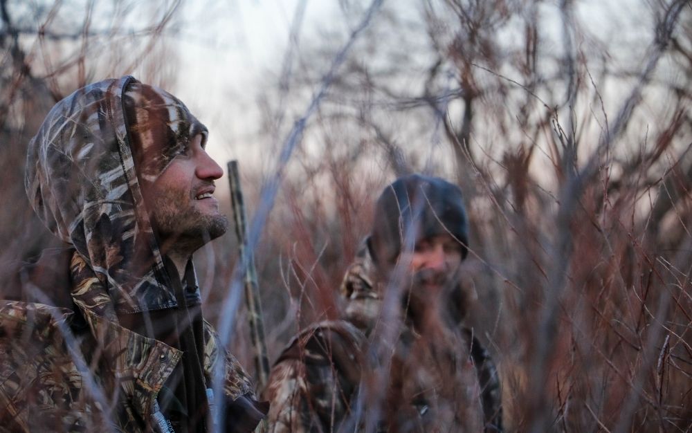 Hunters wearing camouflage.