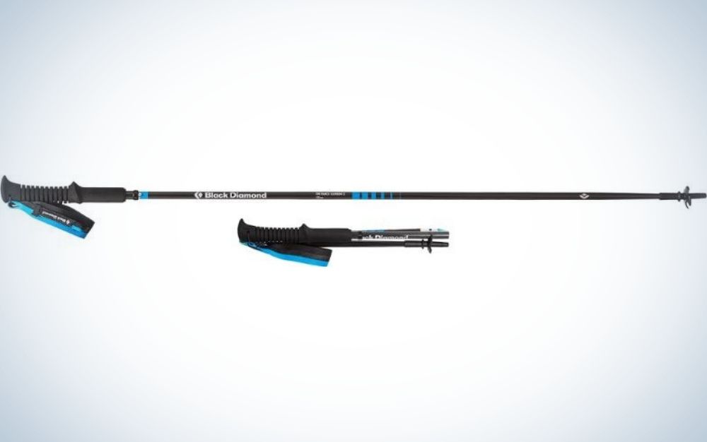 A trekking Pole black and blue, long and thin and with rubber support, as well as a small stick in the same shape but small size.