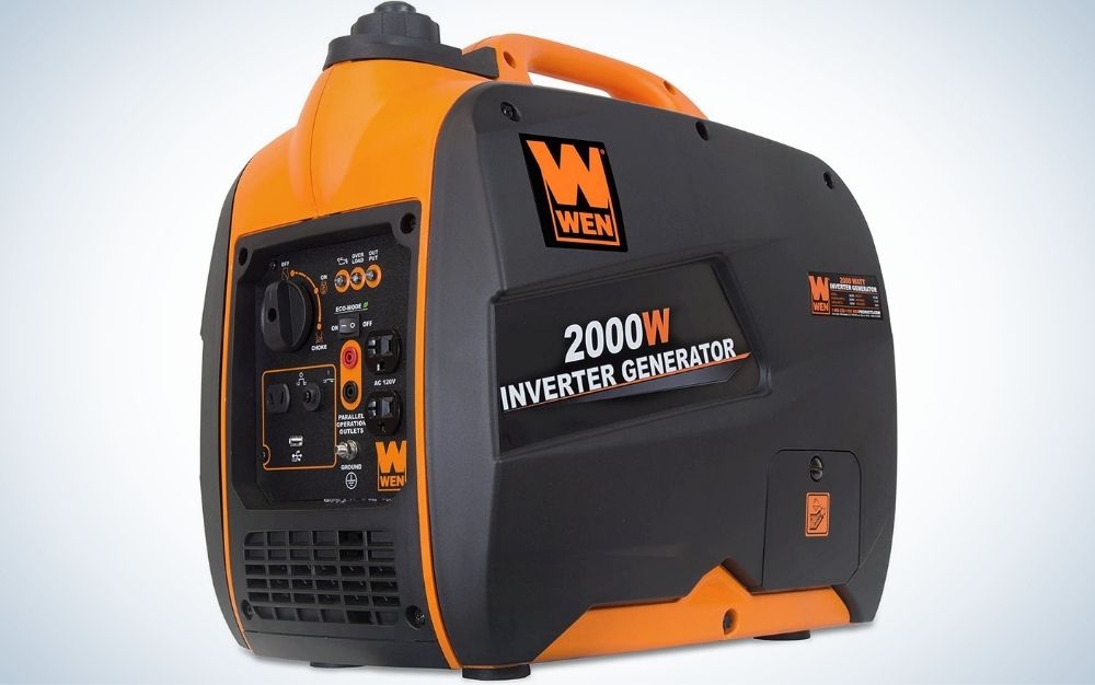 A Wen generator in the form of a large suitcase which is orange in color and with a black holder.