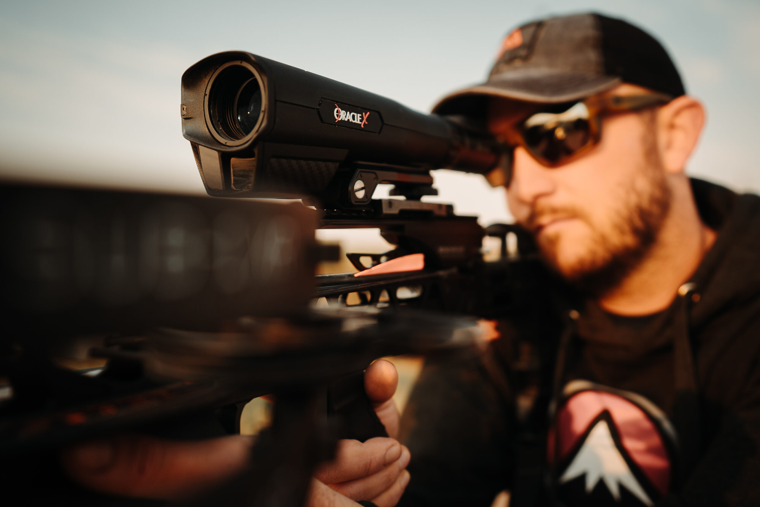 A hunter looks through the Burris Oracle X mounted on a crossbow