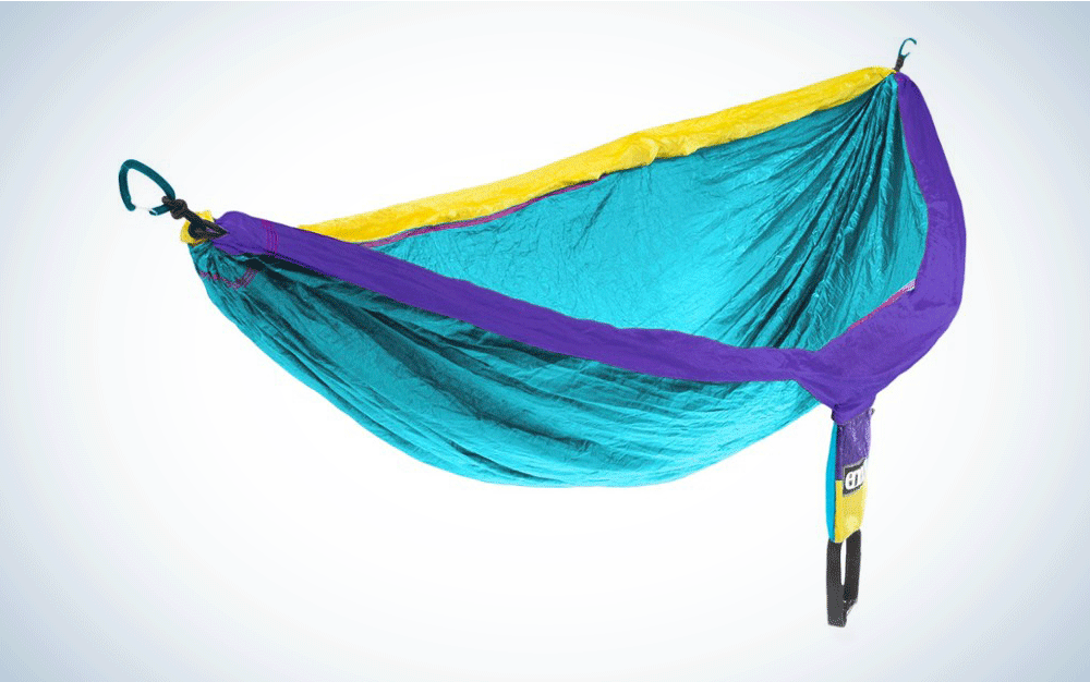 A blue hammock with purple and yellow lining