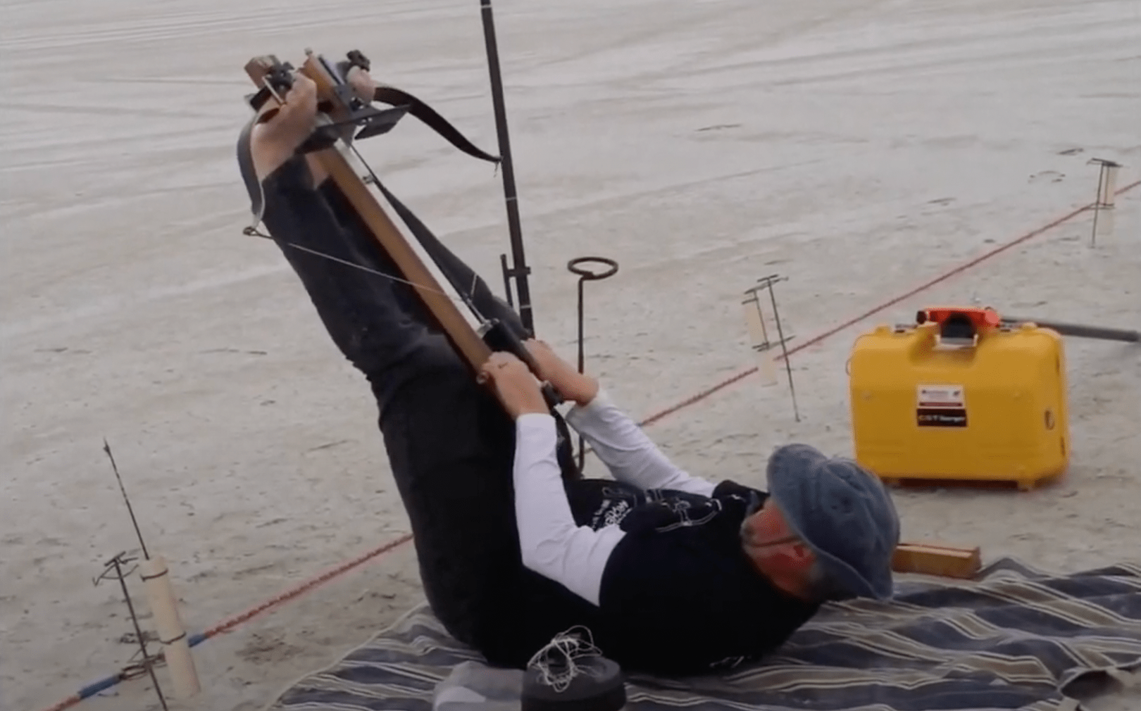 Alan Case tries to break a flight archery record with his footbow.