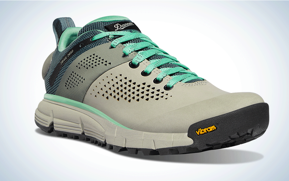 A grey and teal hiking shoe