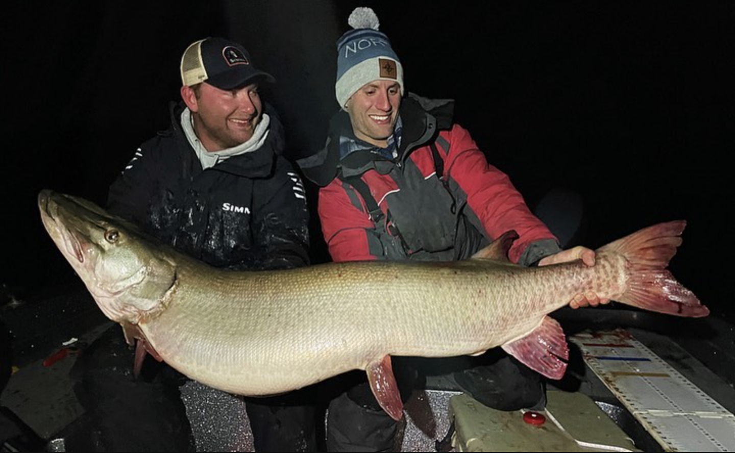 Nolan Sprengeler and Kevin Kray with the possible state-muskie.