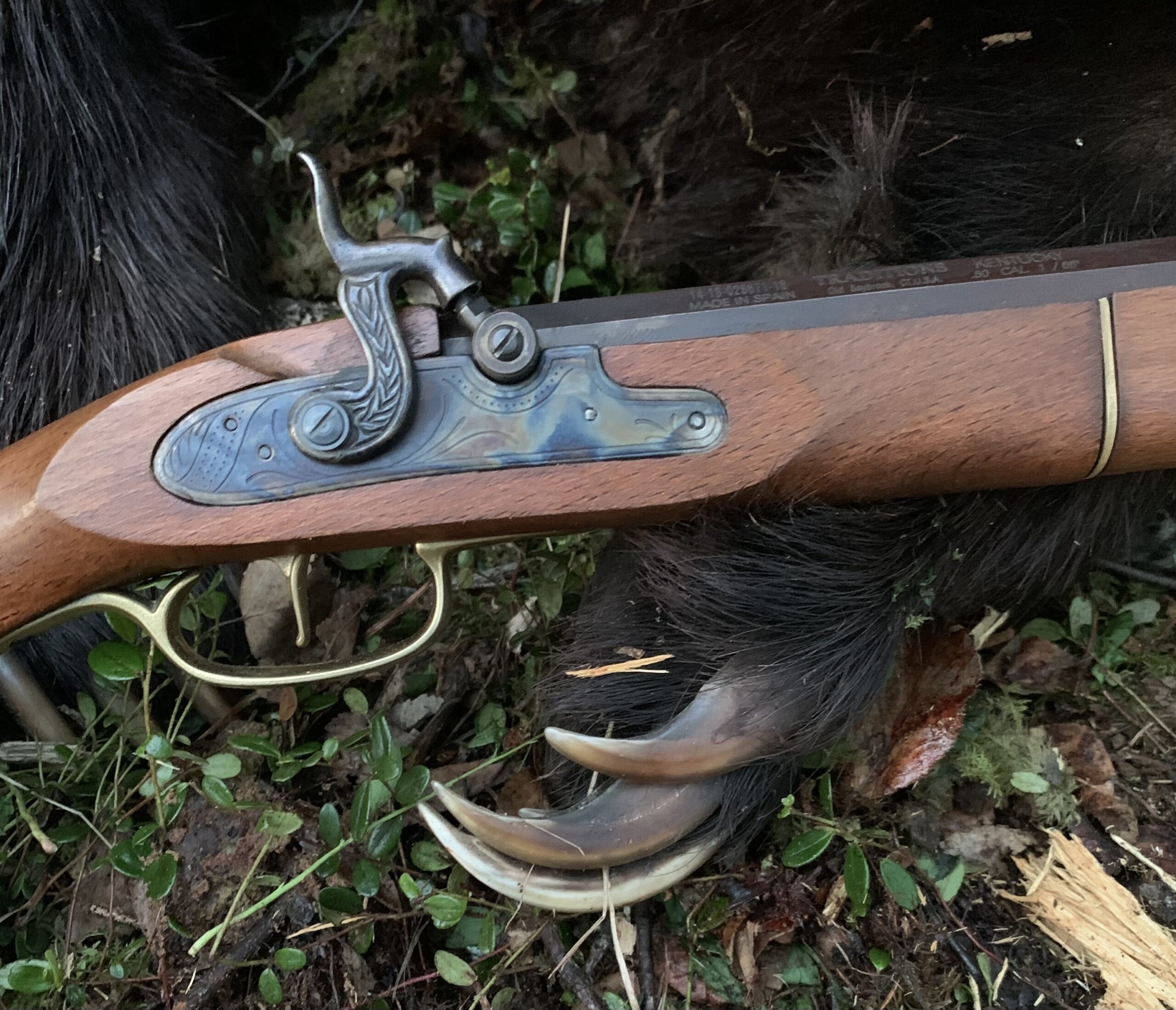 A close-up of a brown rifle