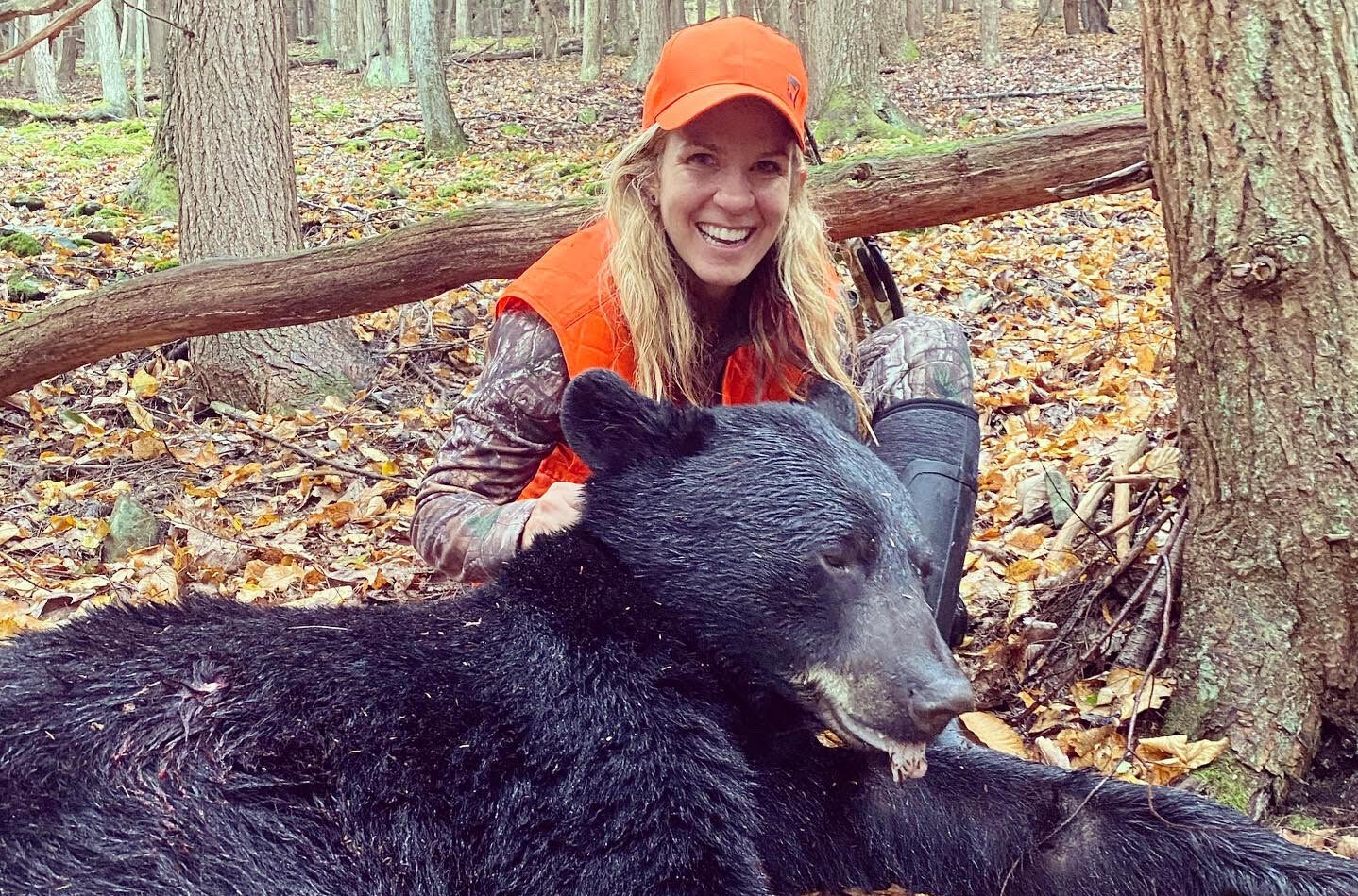 Tressa McCune with a 300-pound public-land black bear.