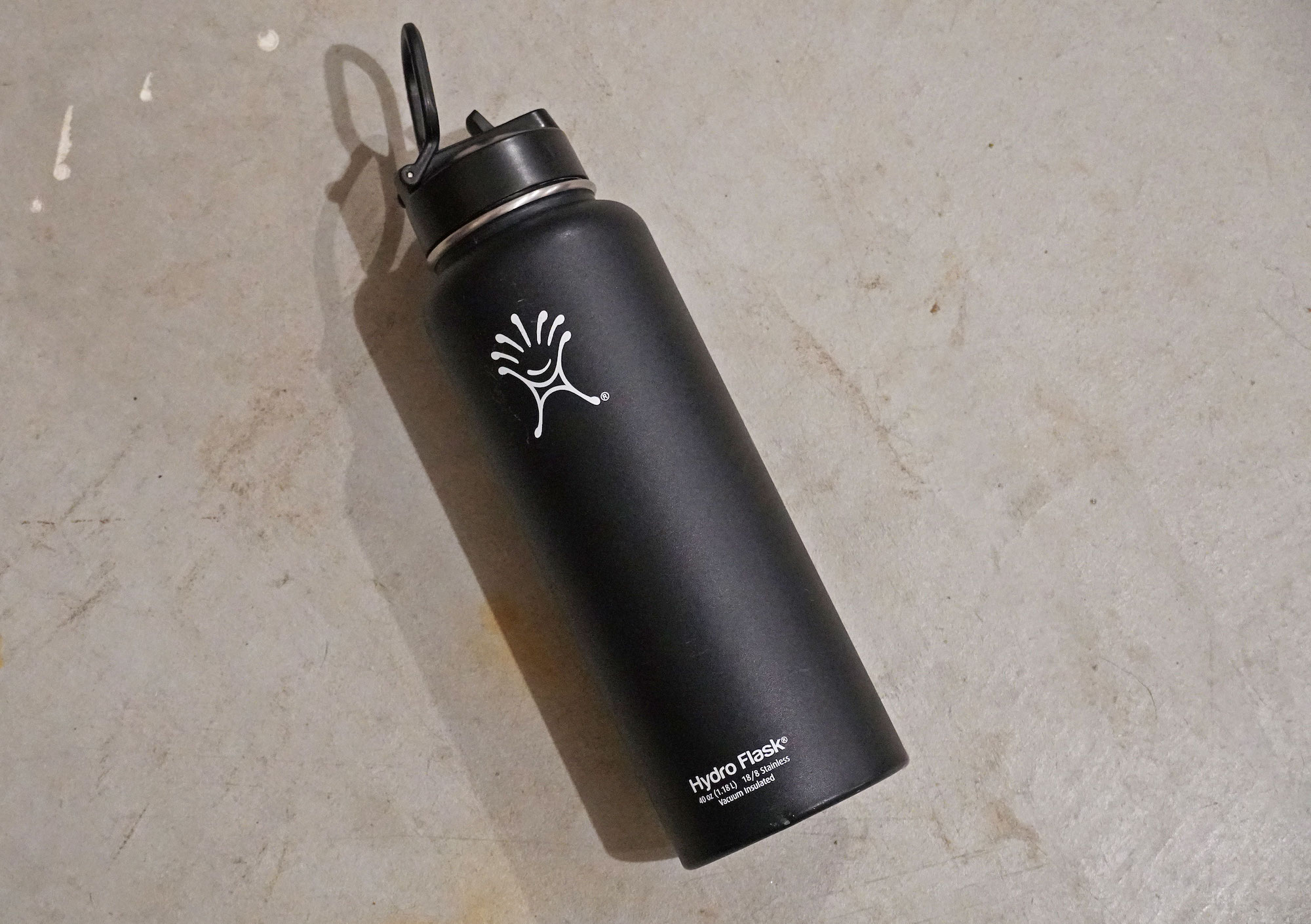 A black Hydro Flask water bottle