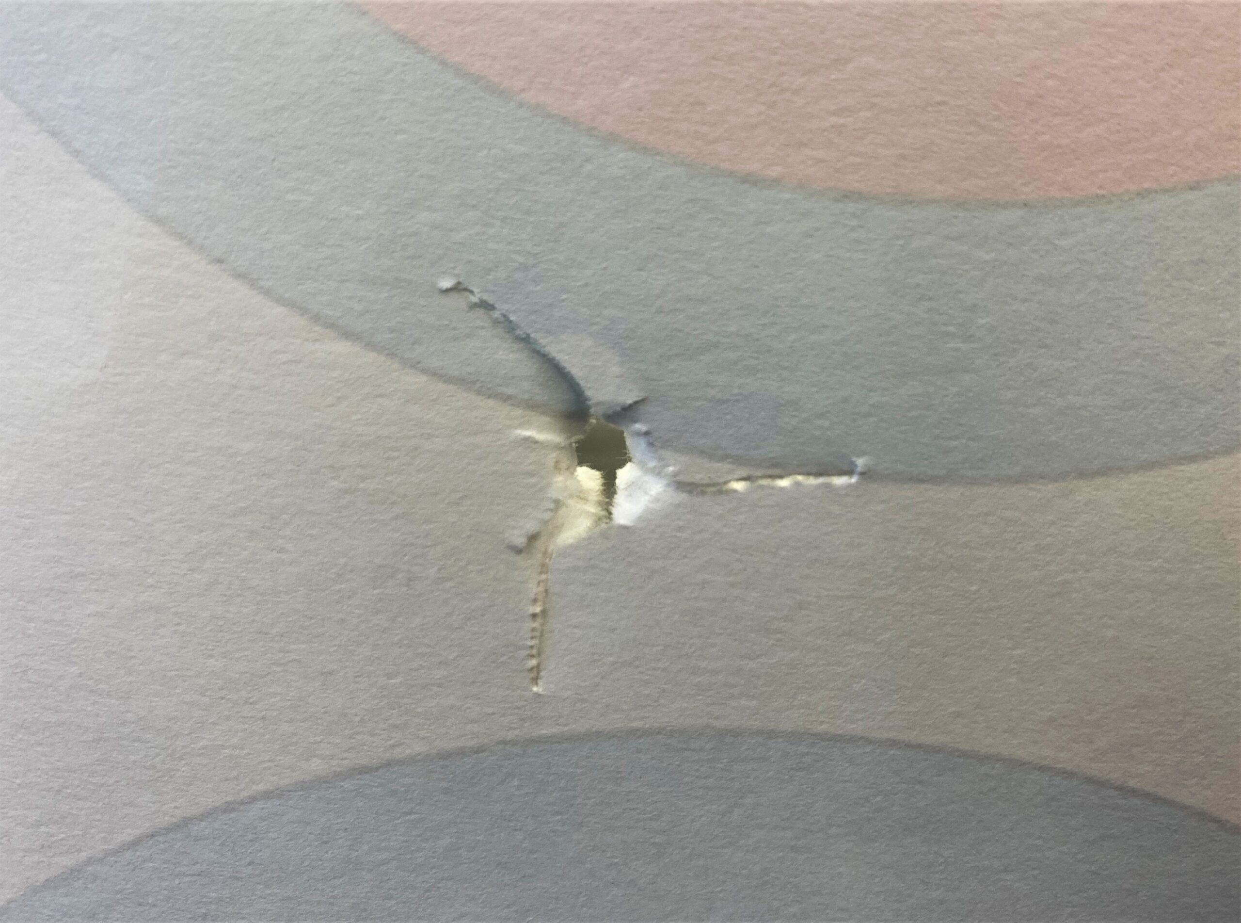 A hole through a paper target