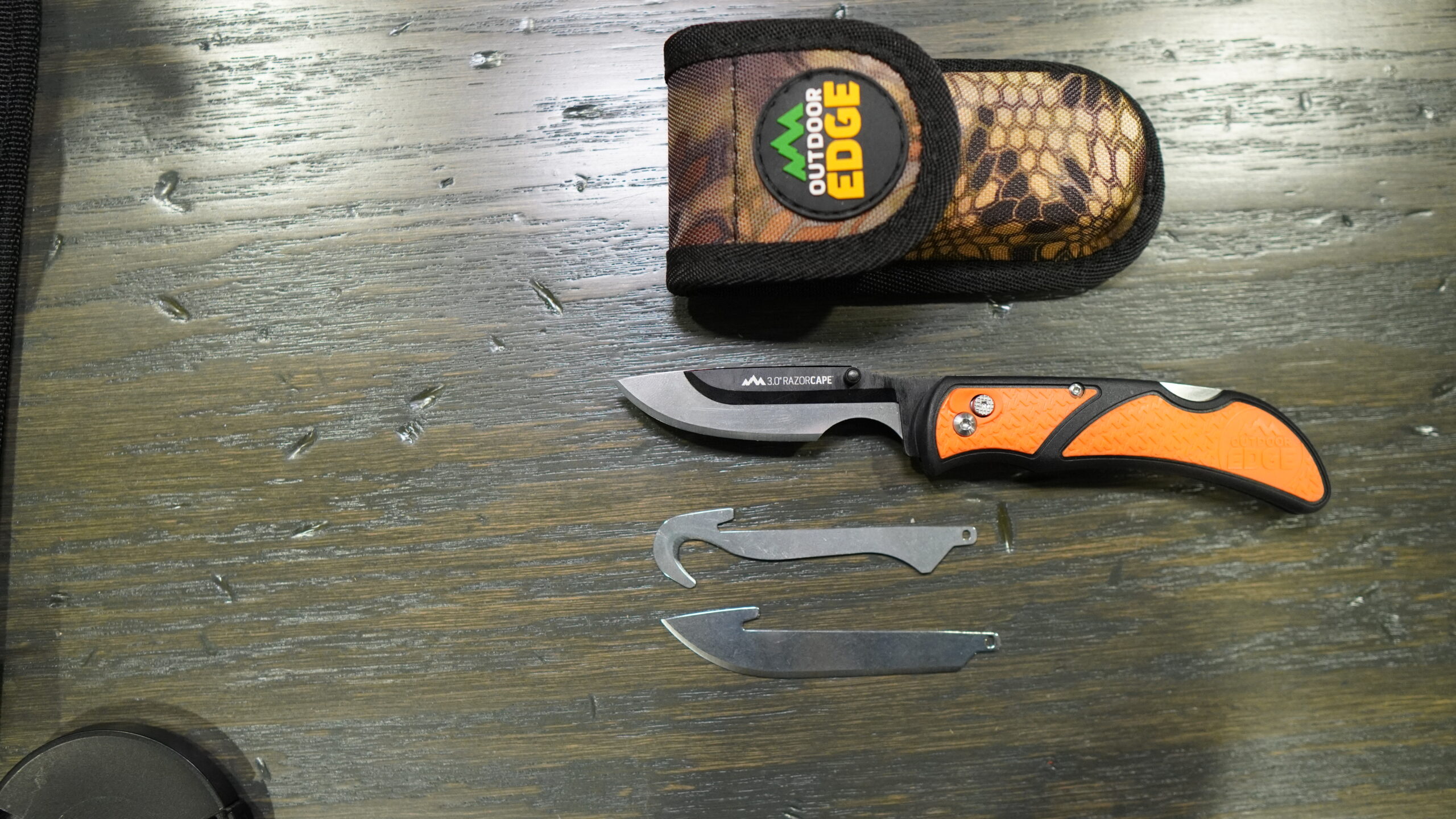 orange folding knife with replaceable blades