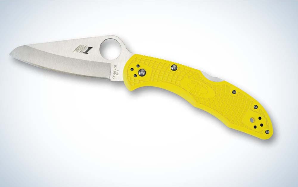 A silver best folding knife with a bright yellow handle