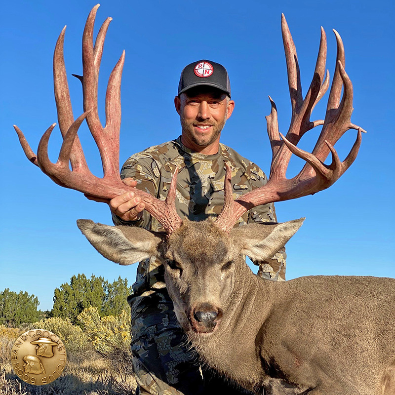 William Heinselman non-typical muley sports more than 63 inches of abnormal antler.