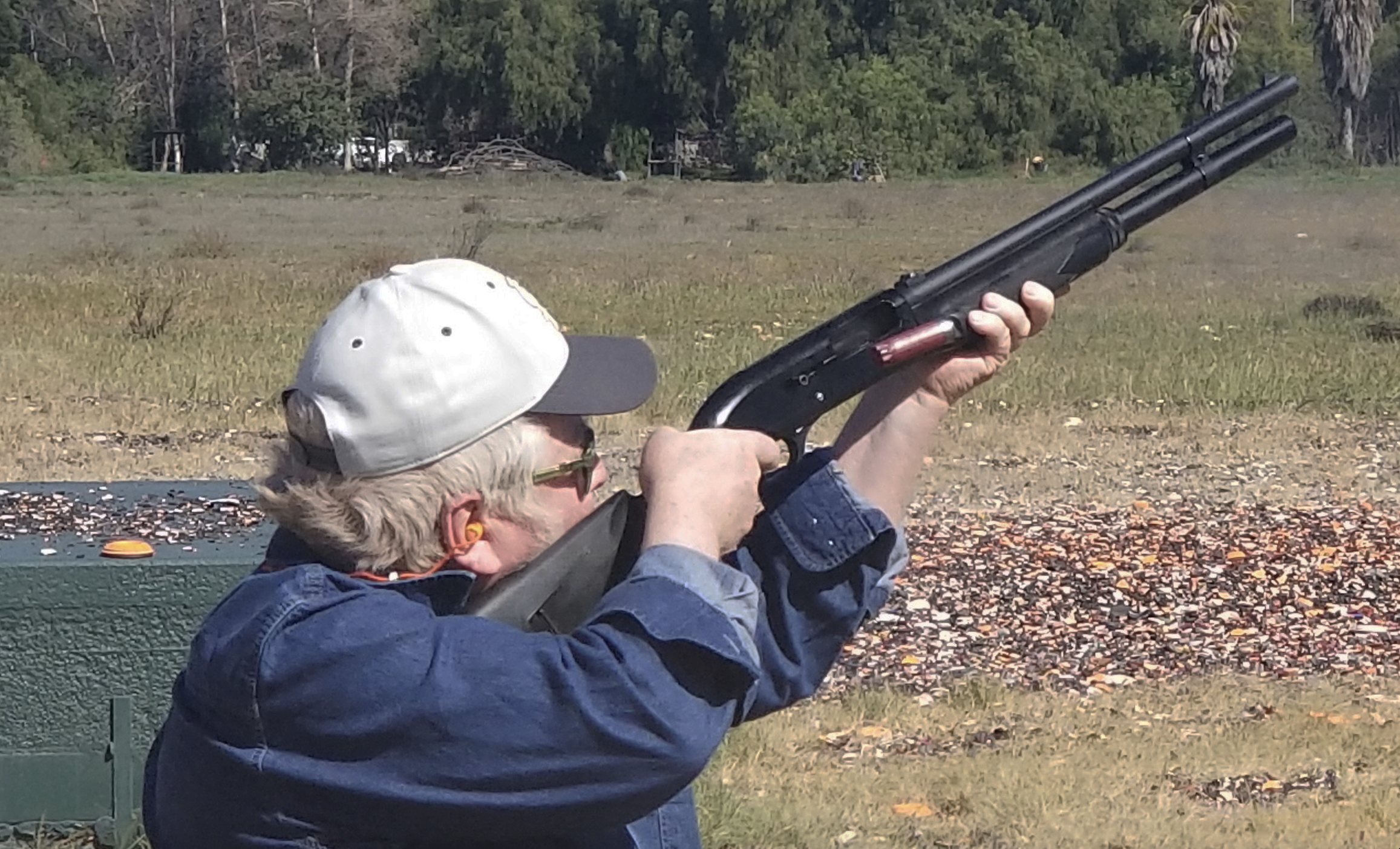 The author shoots a round of skeet with his vintage M1 Super 90.