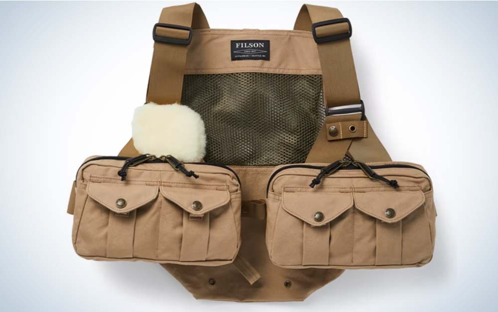 A brown best fly fishing vest with large front pockets