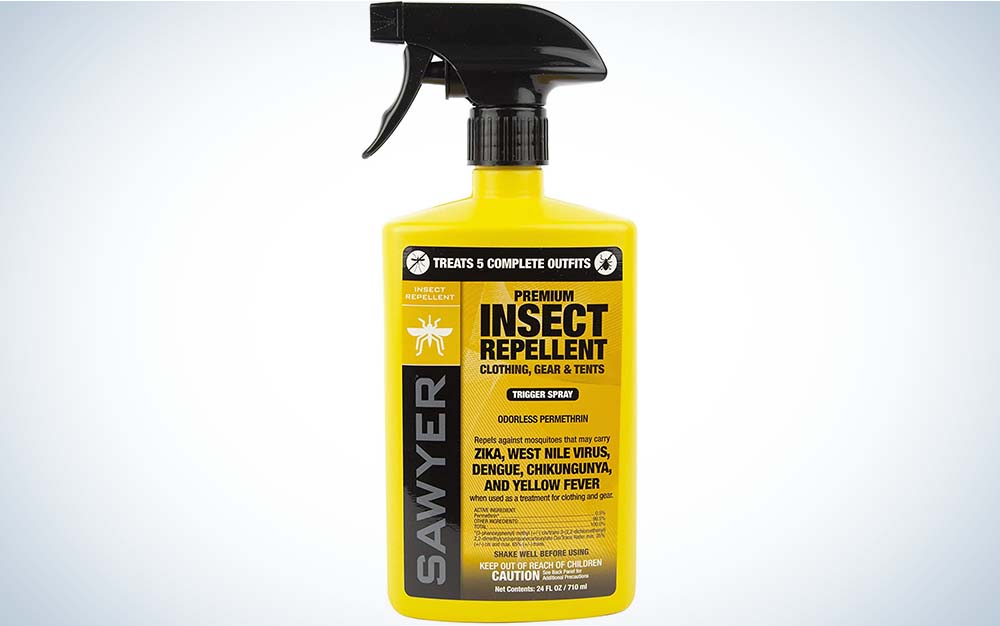 A yellow bottle of best tick repellent spray