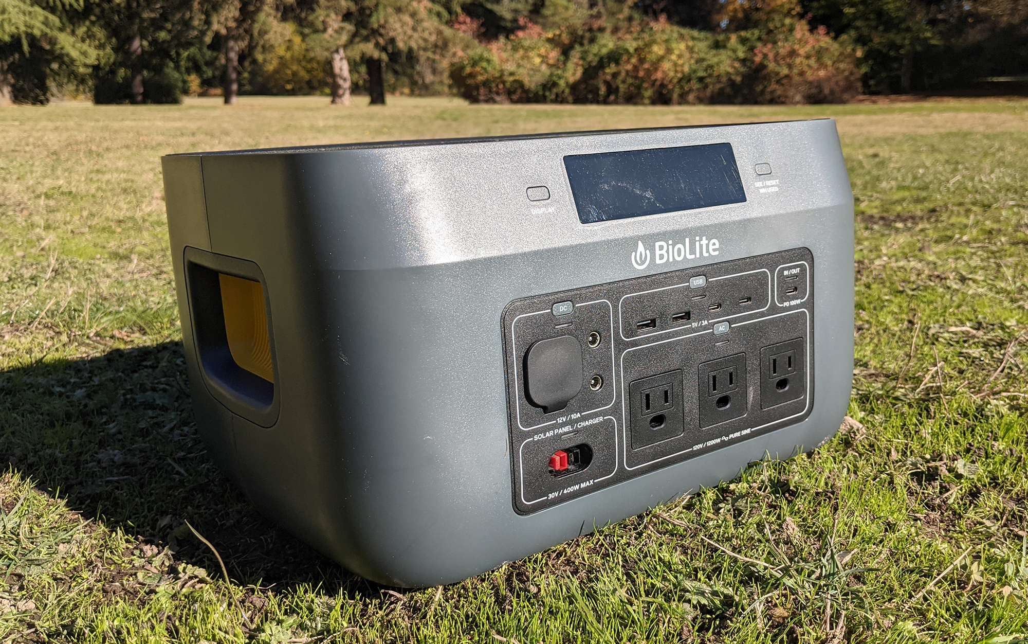 The Biolite 1500 sits in the grass.